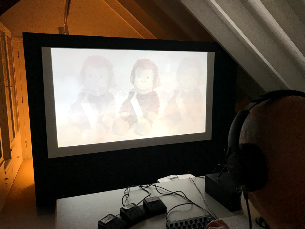 exhibition setup with Oscar on screen